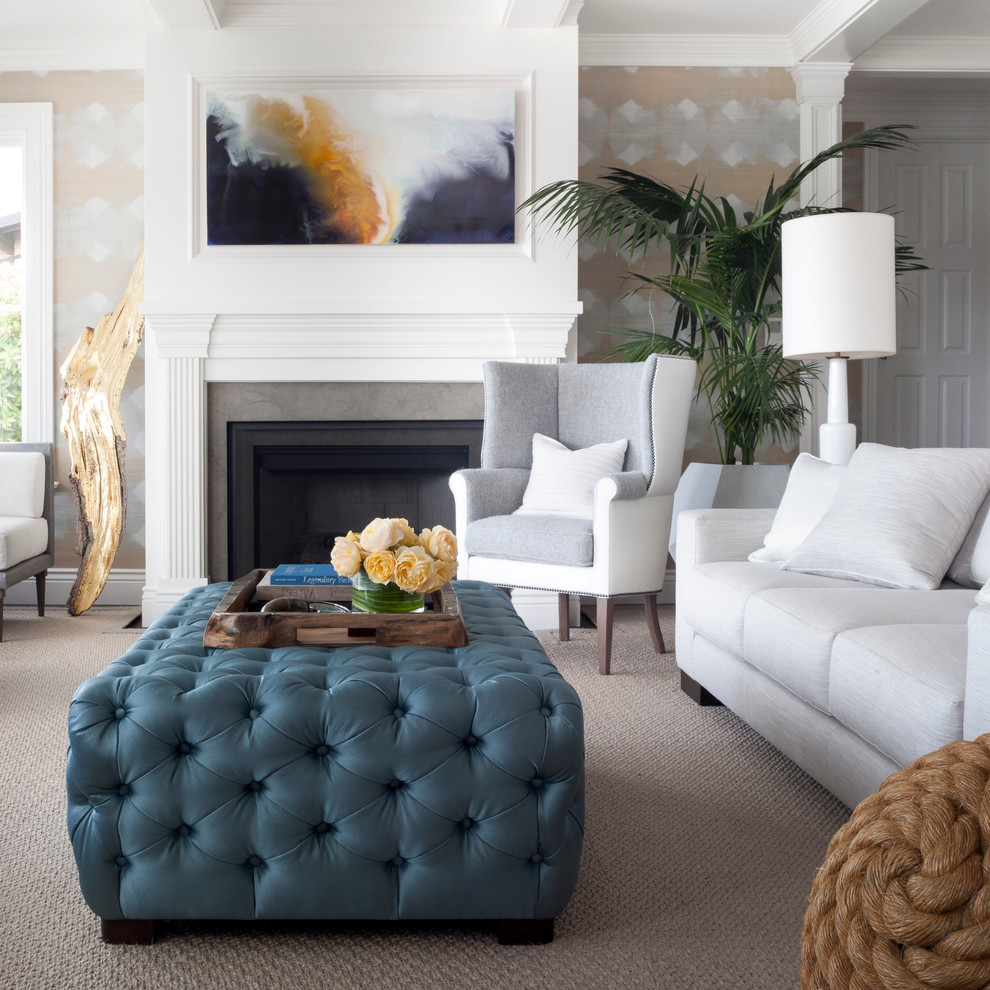 Photo of a transitional formal living room in Los Angeles with multi-coloured walls, carpet and a standard fireplace.