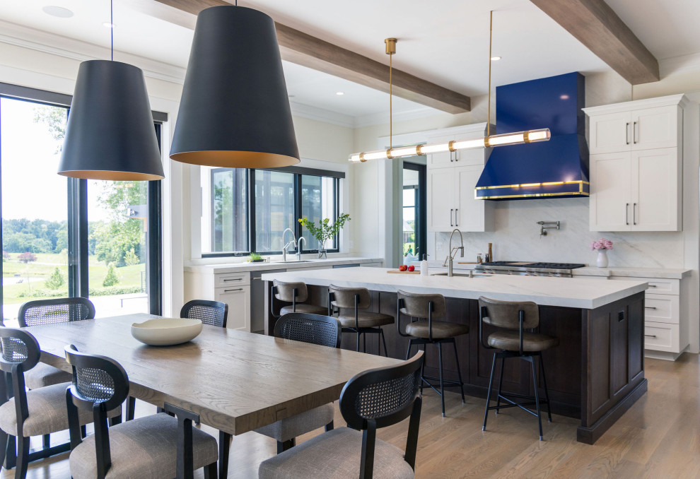 Transitional exposed beam kitchen photo in DC Metro with stone slab backsplash