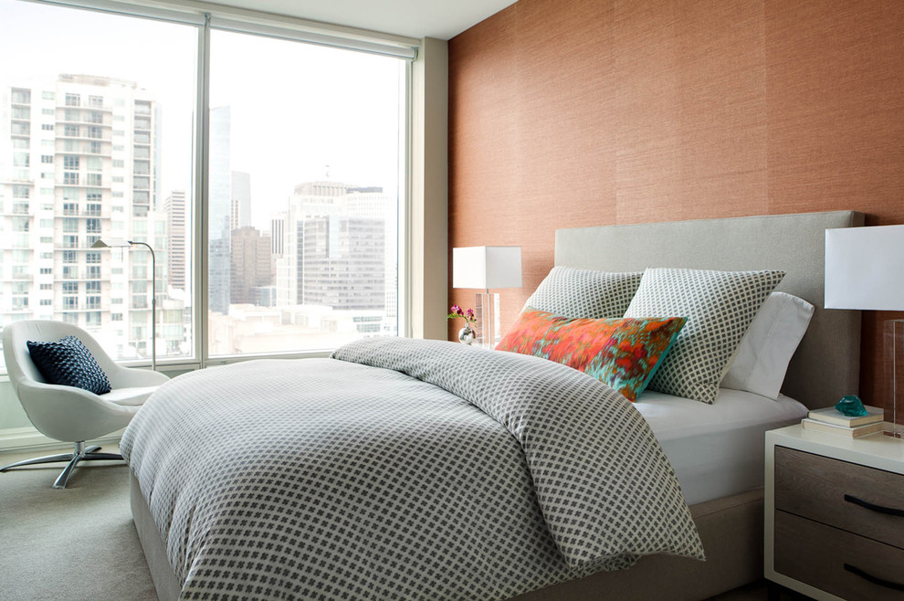 Inspiration for a mid-sized contemporary master bedroom in San Francisco with orange walls and carpet.