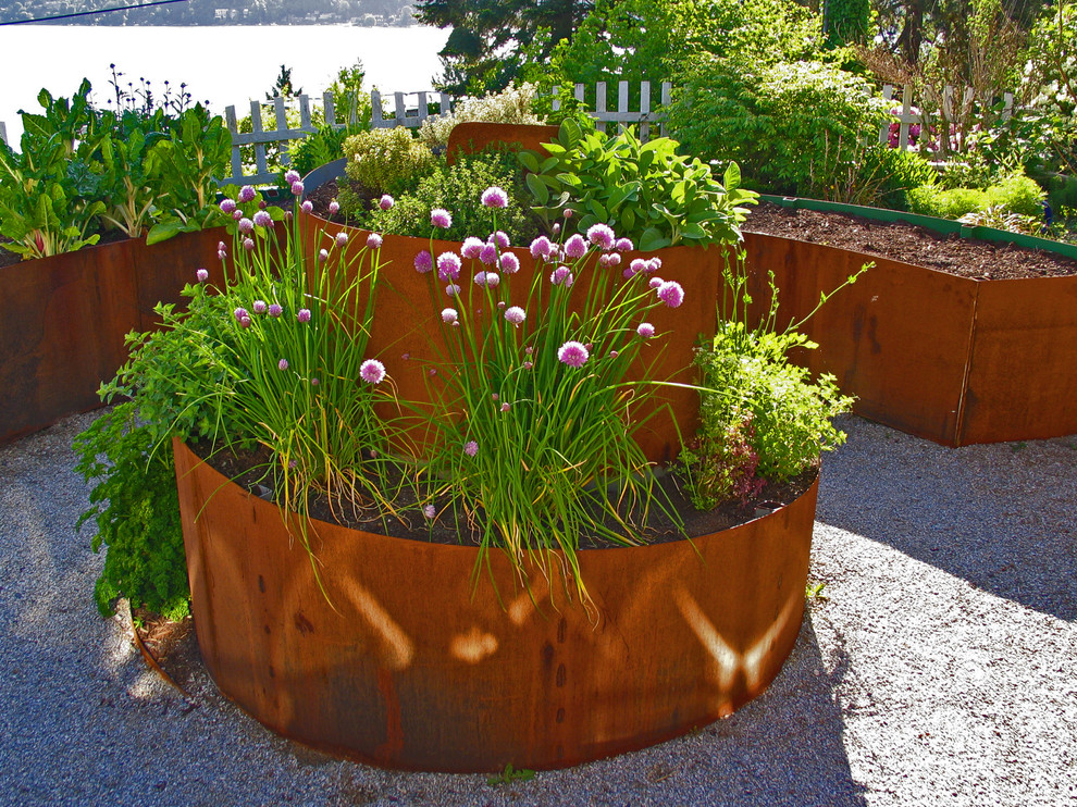 Design ideas for an industrial garden in Seattle with with raised garden bed.