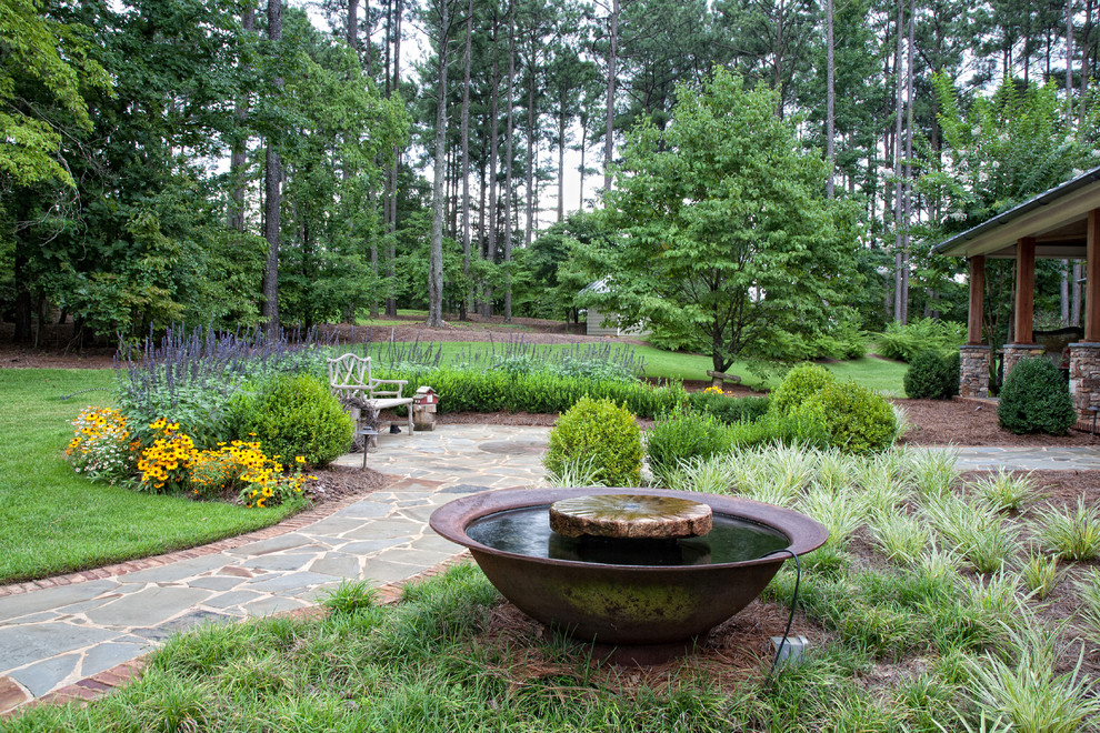 Arts and crafts garden in Atlanta with a water feature.