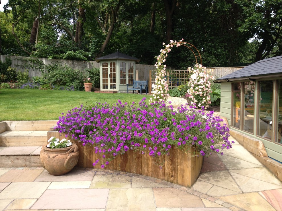 Country garden in Hampshire with with raised garden bed.