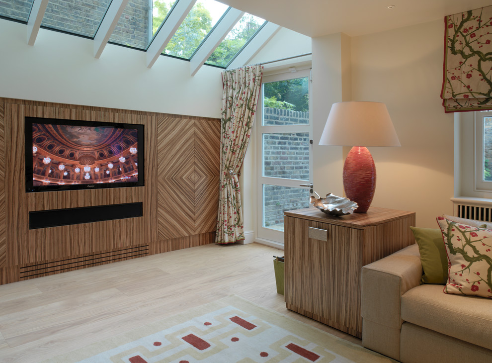 Photo of a contemporary home theatre in London.