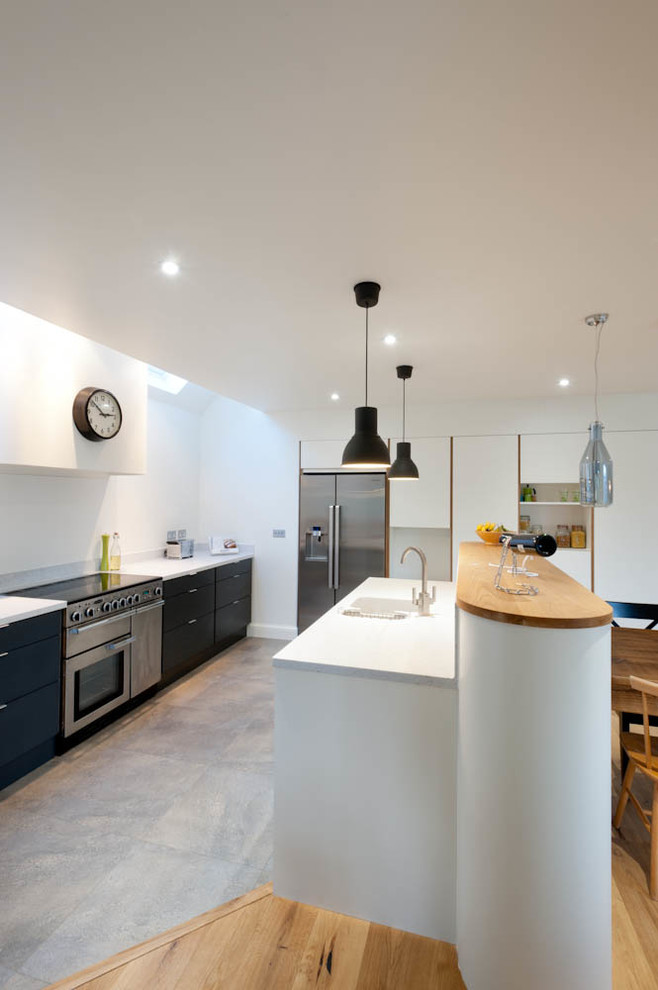 Photo of a large contemporary kitchen in Kent.
