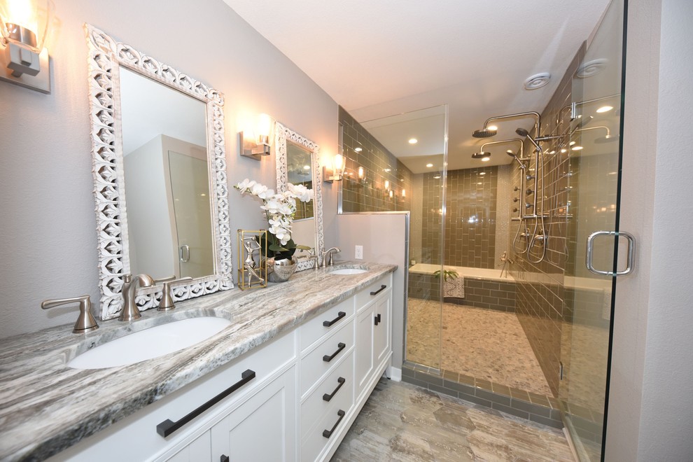 Large transitional master bathroom in Milwaukee with shaker cabinets, white cabinets, an alcove tub, a double shower, brown tile, porcelain tile, grey walls, an undermount sink, granite benchtops, grey floor, a hinged shower door and grey benchtops.