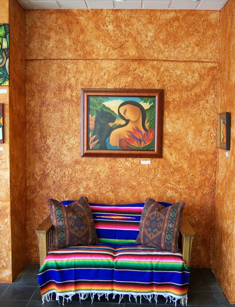 Photo of an entryway in Austin with orange walls.