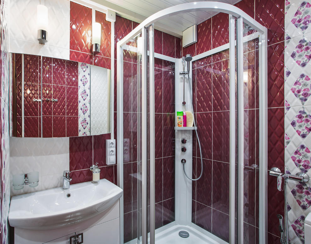 Mid-sized trendy 3/4 multicolored tile and porcelain tile porcelain tile and black floor sliding shower door photo in Saint Petersburg with flat-panel cabinets, white cabinets, a two-piece toilet, multicolored walls and a console sink