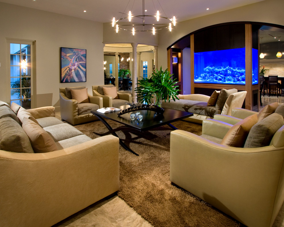 This is an example of a contemporary living room in Orlando with beige walls and no fireplace.