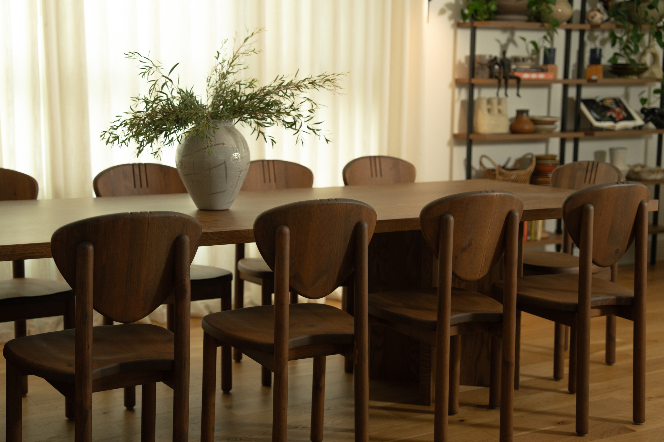 Handcrafted Dining Table Styled with Vintage Roundtop Chairs