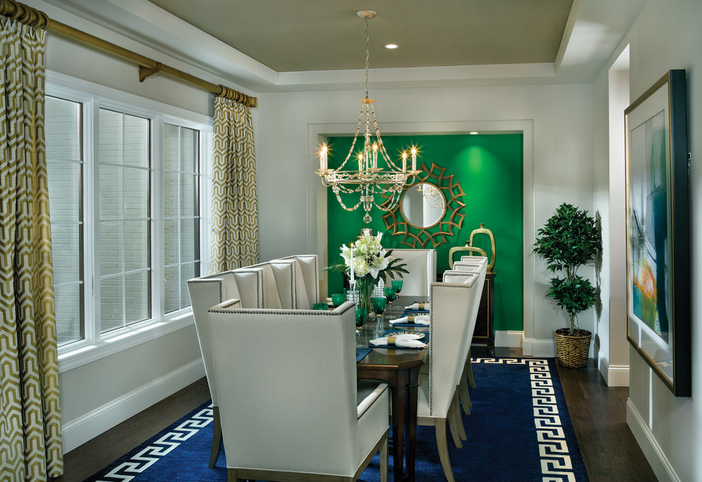 Transitional dark wood floor enclosed dining room photo in Cincinnati with gray walls