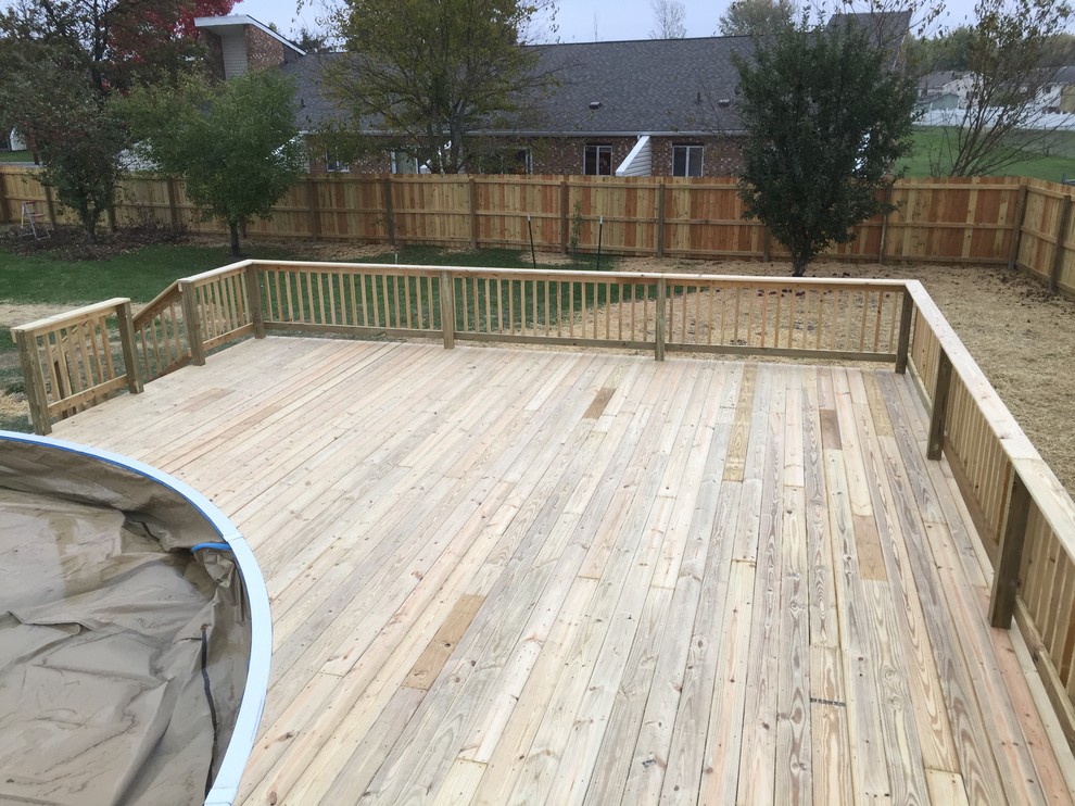 Large backyard deck photo with no cover
