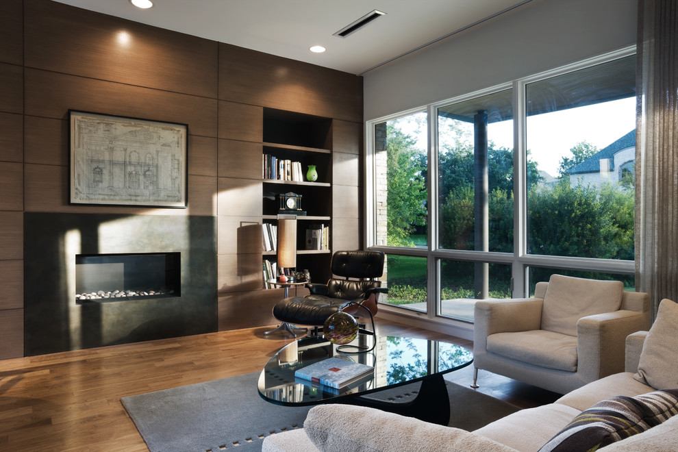 This is an example of a contemporary living room in Dallas.