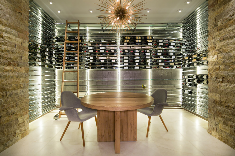 Contemporary wine cellar in Seattle with storage racks and white floor.