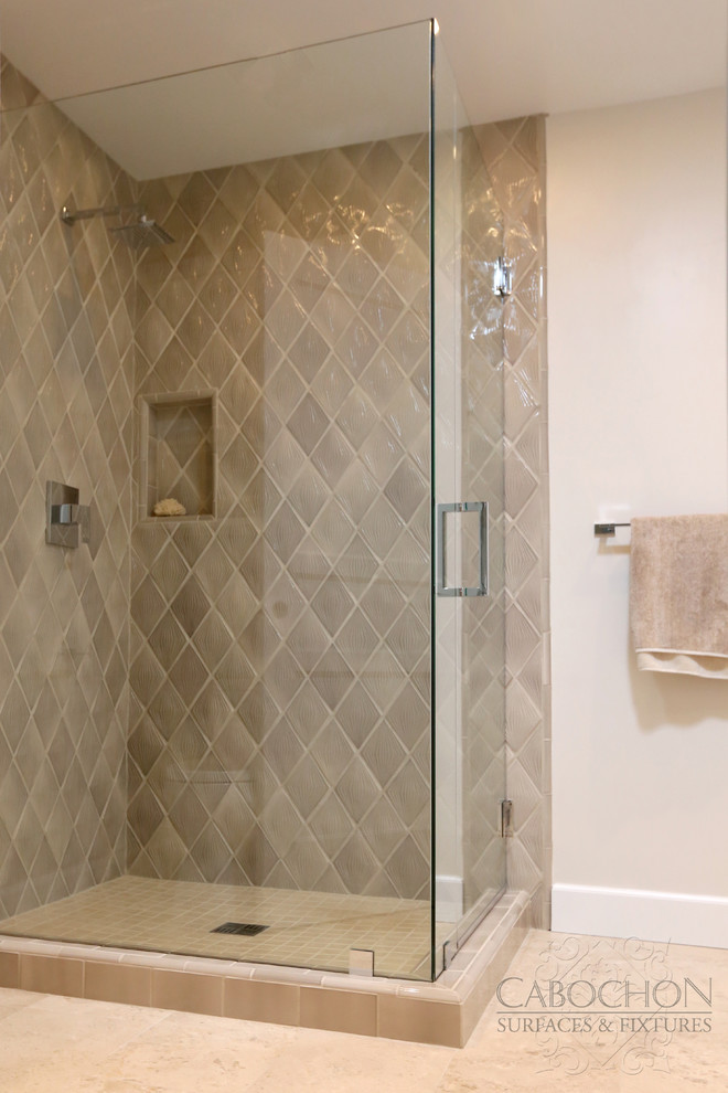 Example of a mid-sized transitional 3/4 beige tile and ceramic tile limestone floor corner shower design in San Diego with shaker cabinets, white cabinets, marble countertops, a two-piece toilet, an undermount sink and beige walls