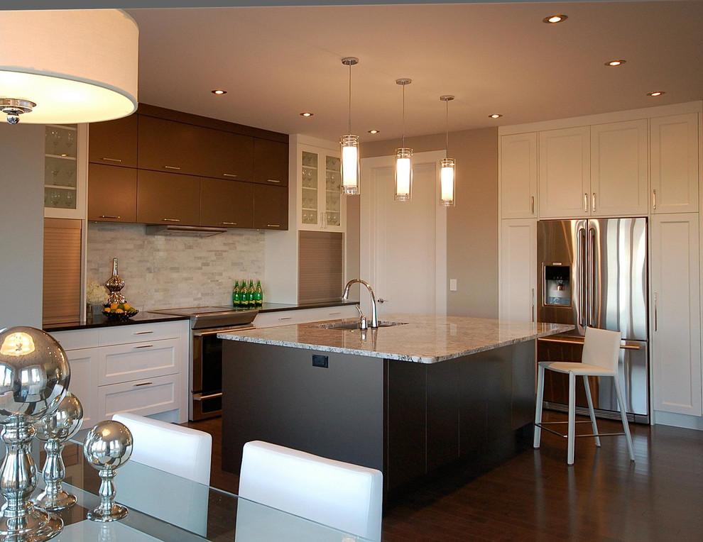 Example of a mid-sized transitional l-shaped dark wood floor eat-in kitchen design in Calgary with an undermount sink, quartz countertops, multicolored backsplash, mosaic tile backsplash, stainless steel appliances and an island