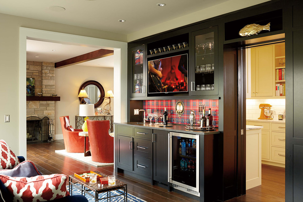 Design ideas for a transitional single-wall wet bar in Minneapolis with an undermount sink, shaker cabinets, black cabinets, multi-coloured splashback and dark hardwood floors.