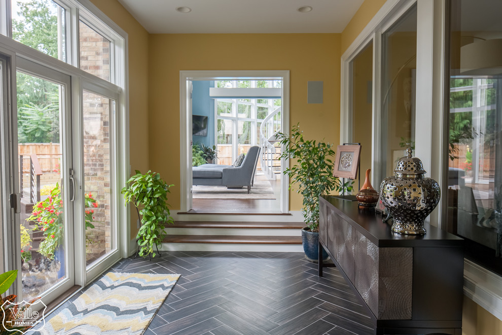 Sunroom - large transitional ceramic tile and black floor sunroom idea with a standard ceiling