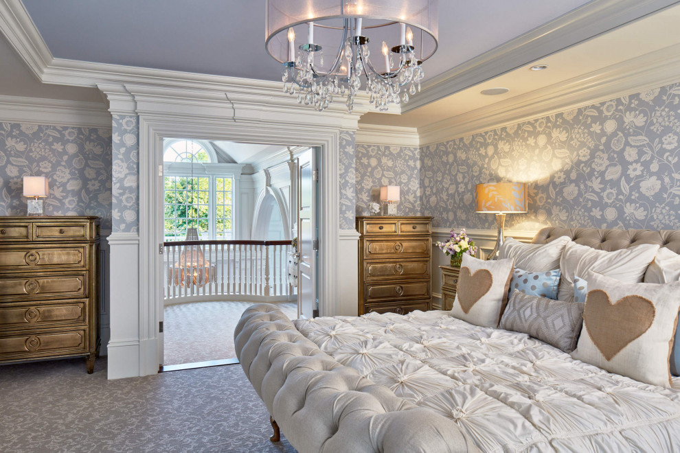 This is an example of a traditional bedroom in Boston with blue walls, blue floor and wallpaper.