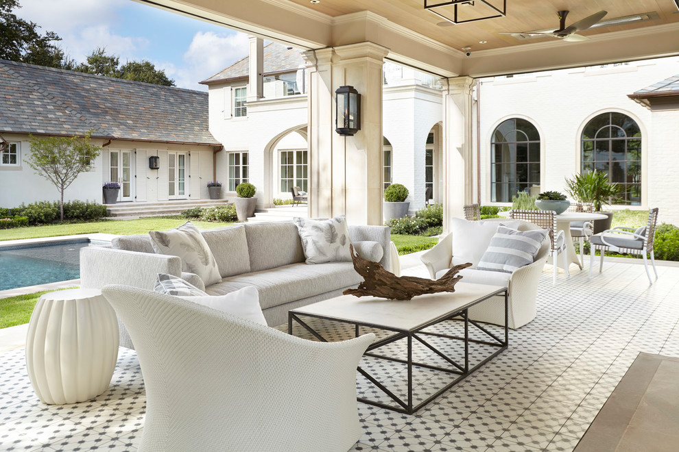 Inspiration for a transitional backyard patio in Dallas with tile and a gazebo/cabana.