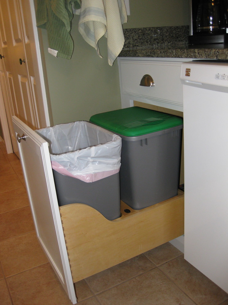 Kitchen - transitional l-shaped ceramic tile and beige floor kitchen idea in Boston with an undermount sink, shaker cabinets, white cabinets, granite countertops, white appliances and green countertops