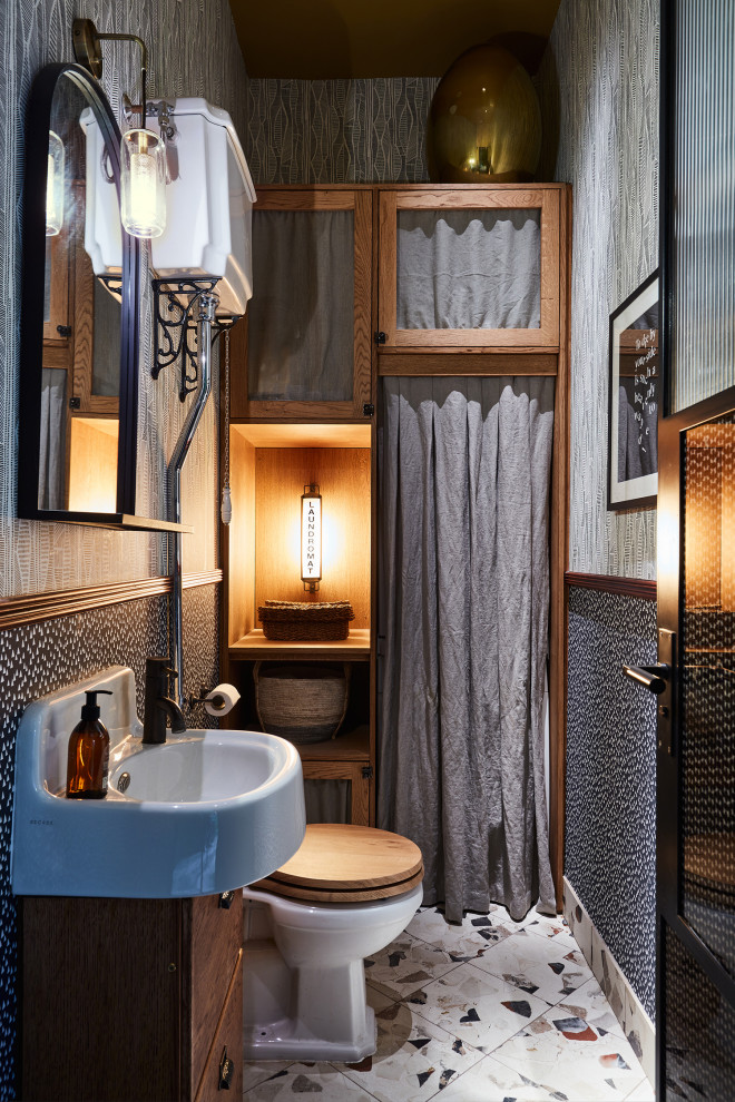 Design ideas for a bohemian cloakroom in London with a dado rail.