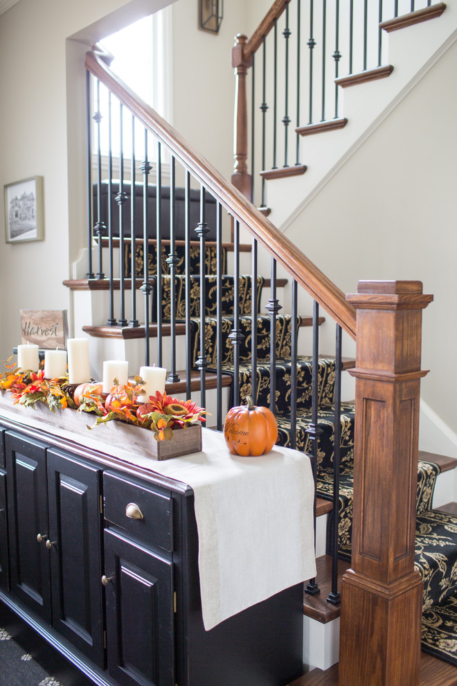 Front door - mid-sized transitional medium tone wood floor and brown floor front door idea with beige walls and a medium wood front door