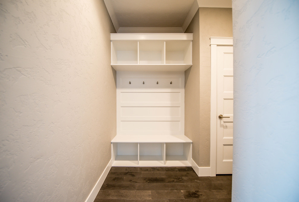 Small transitional dark wood floor mudroom photo in Seattle with gray walls