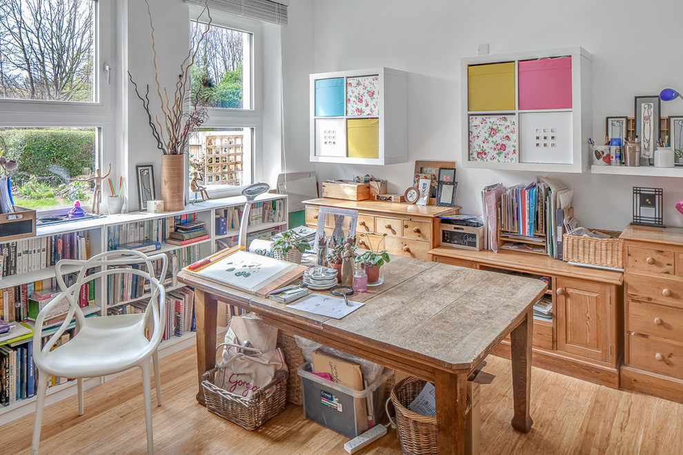 Design ideas for an eclectic home office in Other.