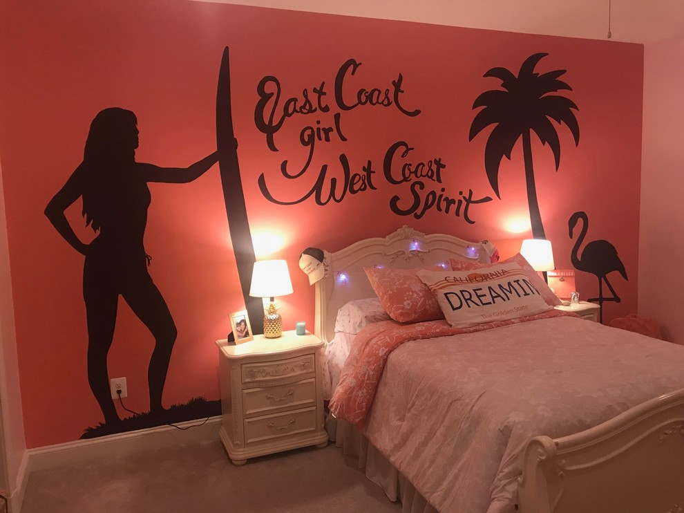 Photo of a mid-sized beach style bedroom in Baltimore with pink walls, carpet and beige floor.