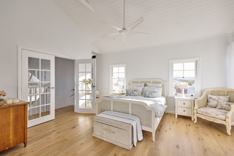Photo of a beach style bedroom in Perth.