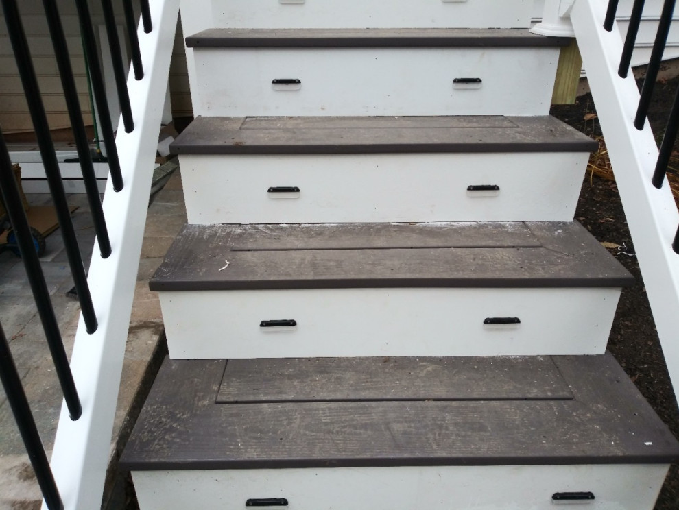Inspiration for a mid-sized transitional backyard second story mixed material railing deck remodel with no cover