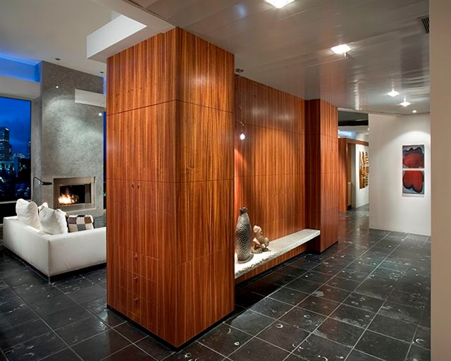 Photo of a large contemporary foyer in Phoenix with white walls and porcelain floors.