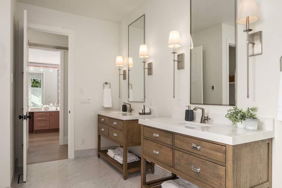 Design ideas for a large transitional bathroom in Seattle with medium wood cabinets, porcelain tile, white walls, marble floors and white floor.