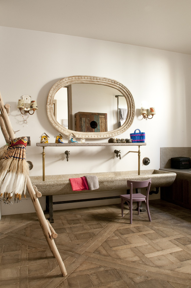 Design ideas for a large eclectic kids bathroom in Paris with a trough sink, white walls and medium hardwood floors.