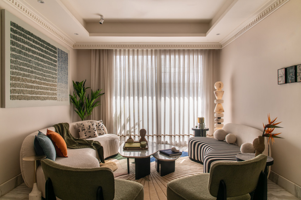 Design ideas for a contemporary living room in Delhi With Beige Walls and Gray.