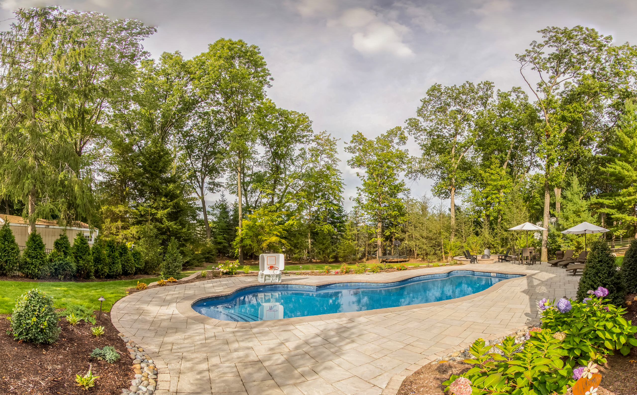 Creating a pool area on a sloped backyard