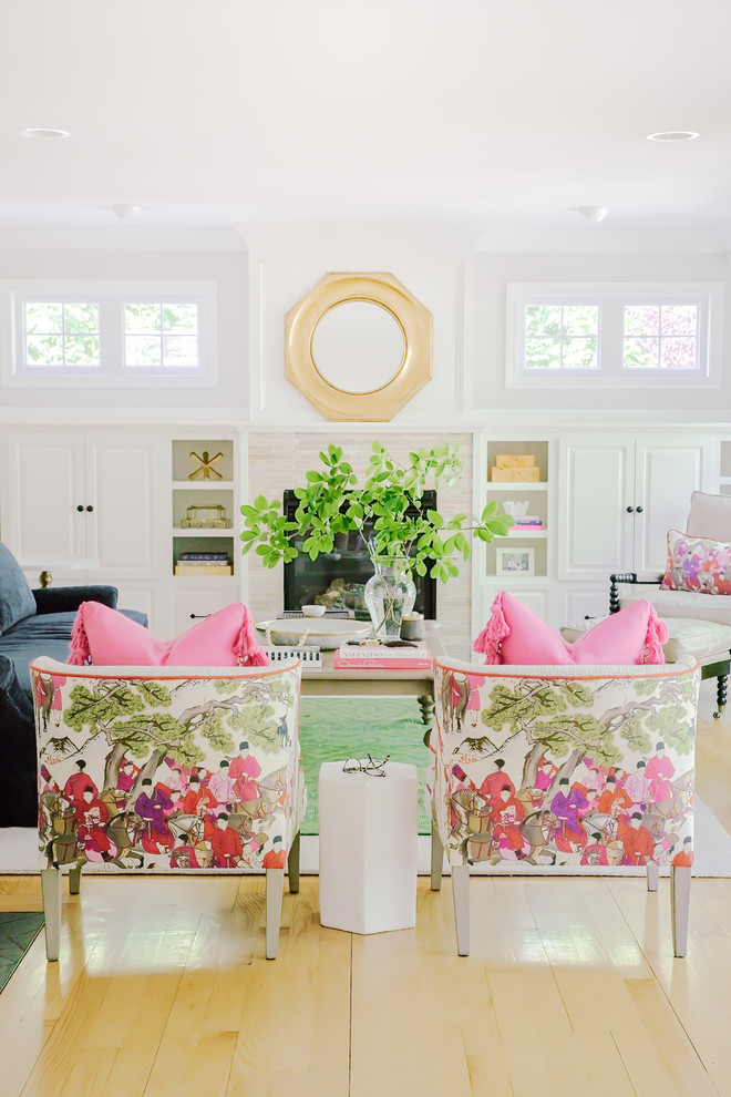 Example of a mid-sized transitional open concept light wood floor living room design in Providence with white walls, a standard fireplace, a stone fireplace and no tv
