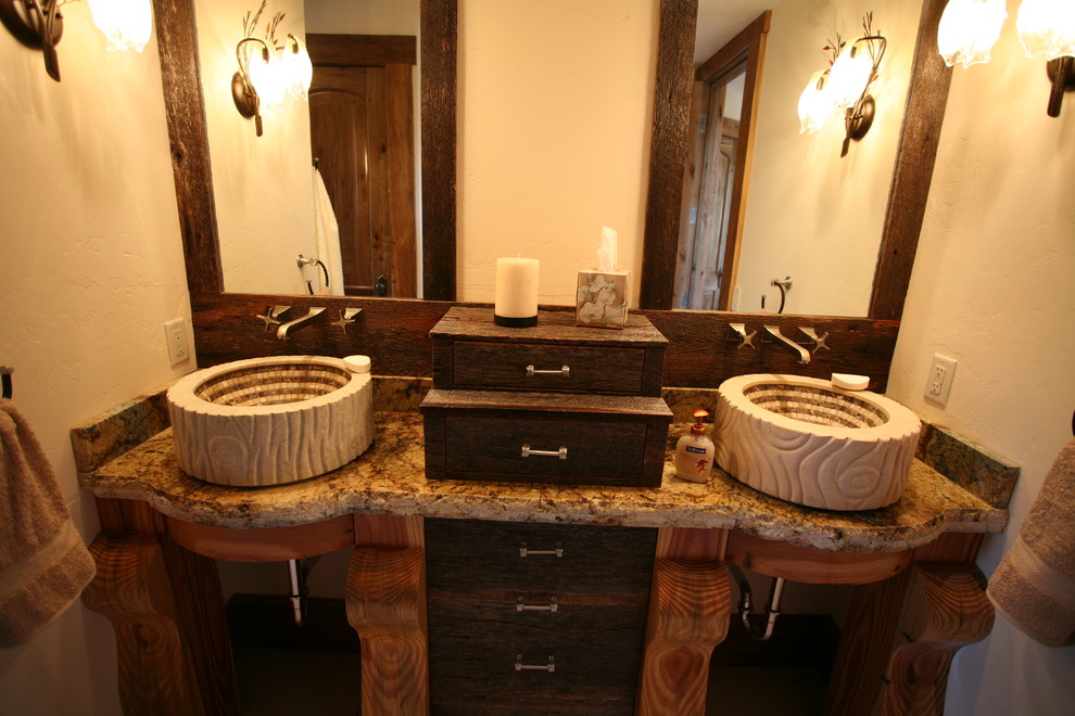 Mid-sized mountain style 3/4 porcelain tile and beige floor alcove shower photo with furniture-like cabinets, medium tone wood cabinets, a two-piece toilet, yellow walls, an integrated sink, granite countertops and a hinged shower door
