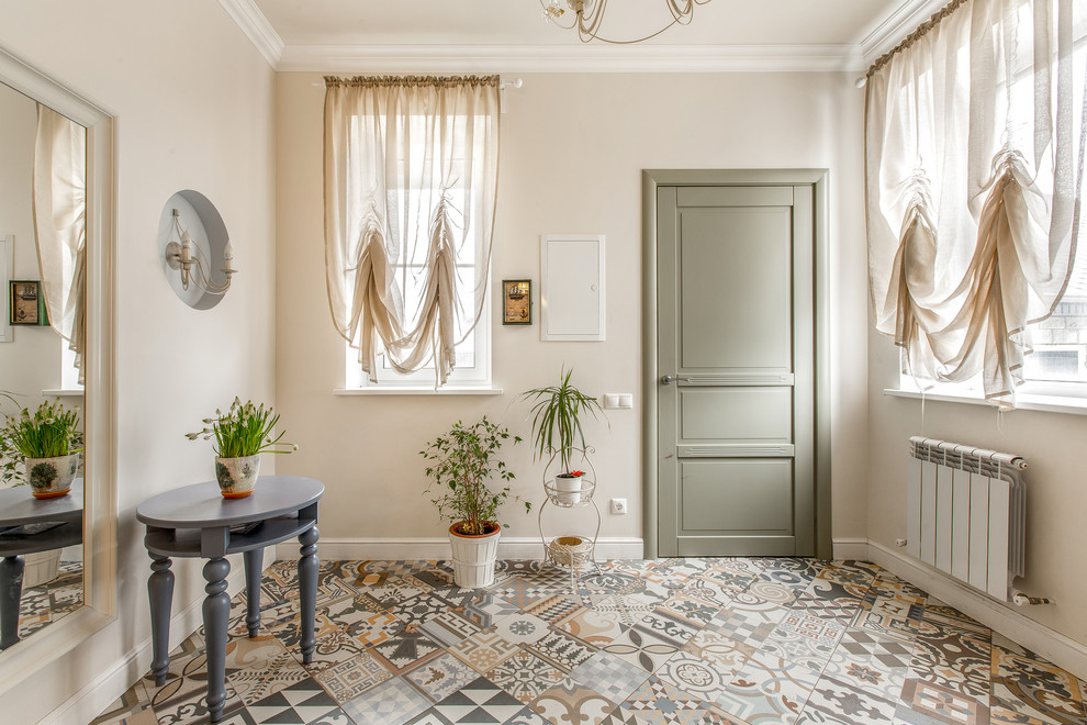 Traditional foyer in Other with beige walls, a single front door and a green front door.