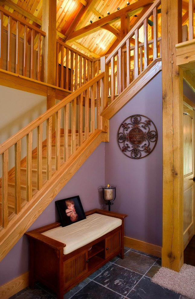 Mid-sized arts and crafts foyer in Columbus with purple walls, ceramic floors, a single front door and a dark wood front door.