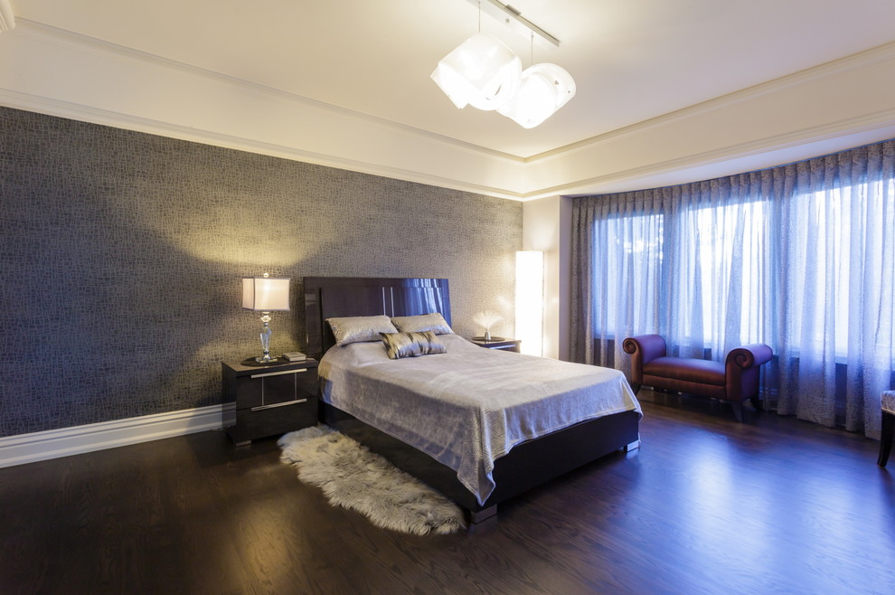 This is an example of a large transitional master bedroom in Toronto with grey walls, dark hardwood floors and no fireplace.