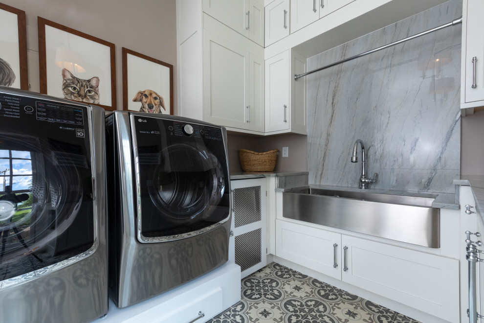 Design ideas for a transitional u-shaped laundry room in Other with a farmhouse sink, shaker cabinets, white cabinets, marble benchtops and grey benchtop.