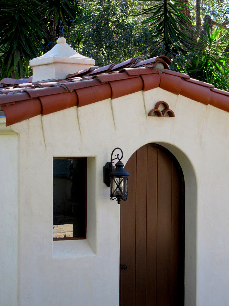 Small mediterranean detached garden shed in Santa Barbara.