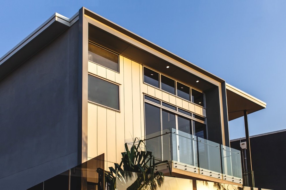 Mid-sized contemporary three-storey exterior in Brisbane.