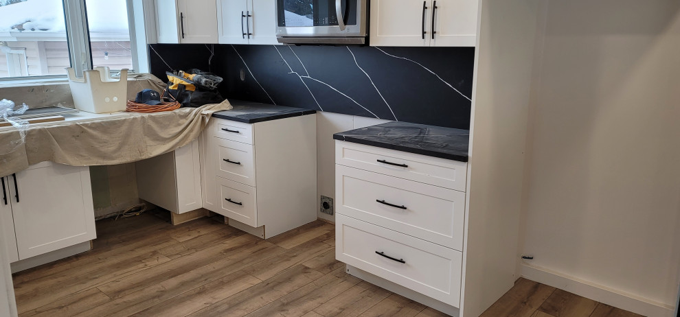 Arts and crafts home design photo in Edmonton