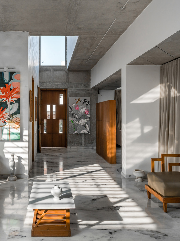 Inspiration for a contemporary entryway in Ahmedabad.