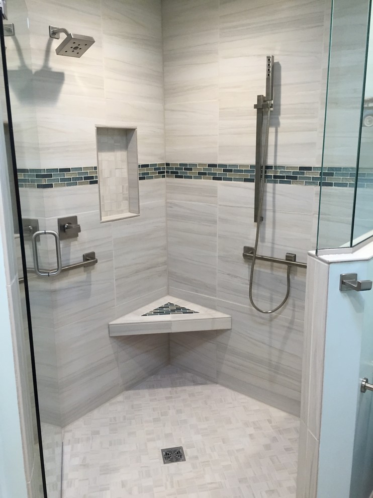Mid-sized transitional gray tile and porcelain tile ceramic tile and gray floor walk-in shower photo in Phoenix with shaker cabinets, white cabinets, blue walls, an undermount sink, granite countertops and a hinged shower door