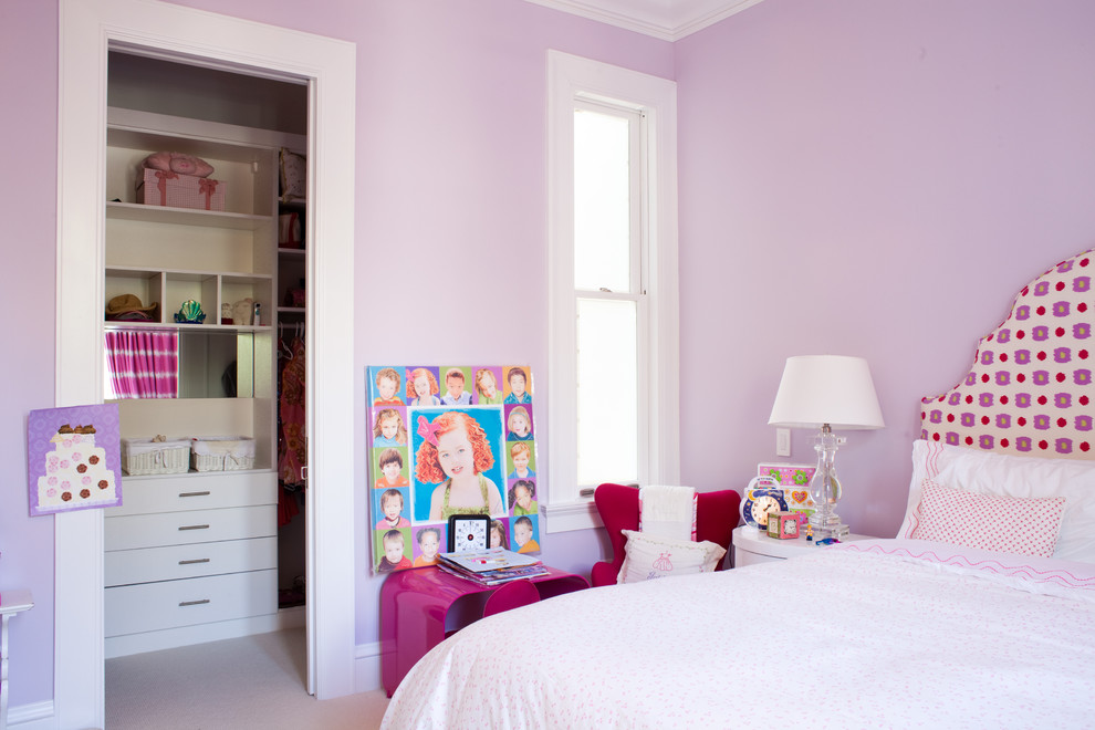 Photo of a contemporary kids' room in Other with purple walls.