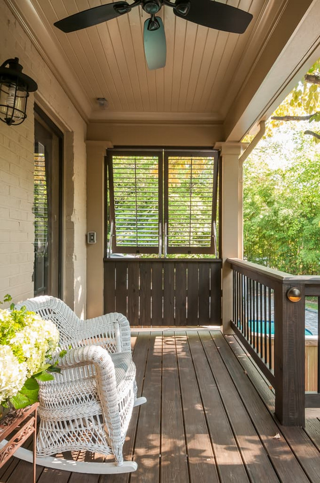Inspiration for a large arts and crafts backyard verandah in Atlanta with decking and a roof extension.