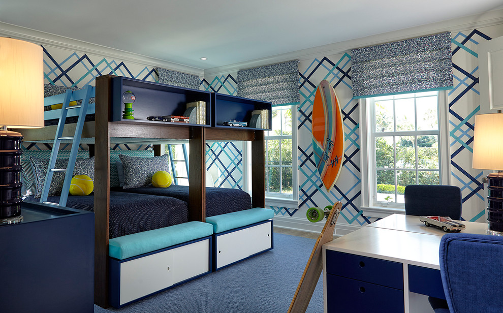 Inspiration for a tropical kids' bedroom for boys in Miami with light hardwood floors.